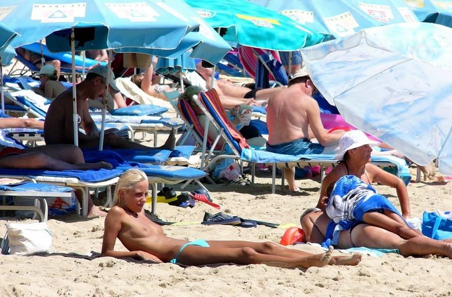 15P Gorgeous blonde Russian nudist sunbathes naked