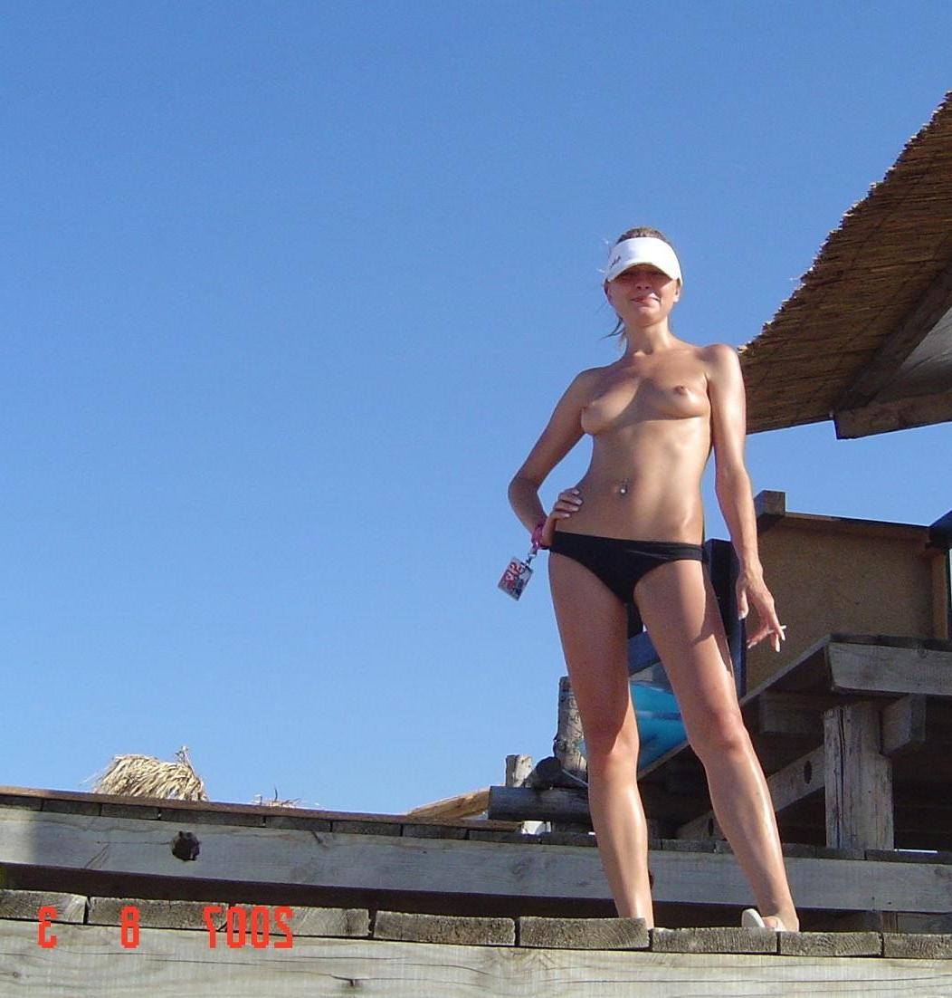15P Check out gorgeous blonde nudist having some fun