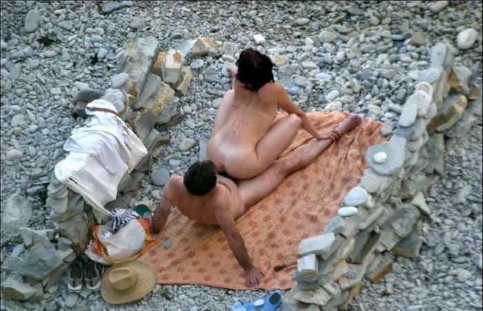 15P Gorgeous blonde nudist babe plays in the water