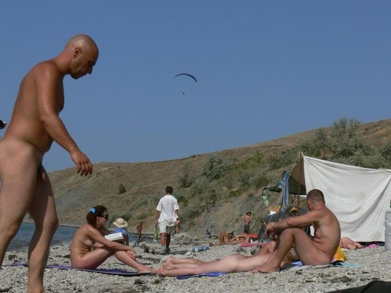 15P Wild redhead teen dances nude at a public beach