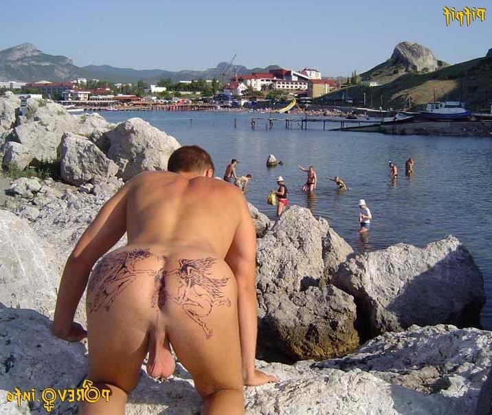 15P Wild redhead teen dances nude at a public beach