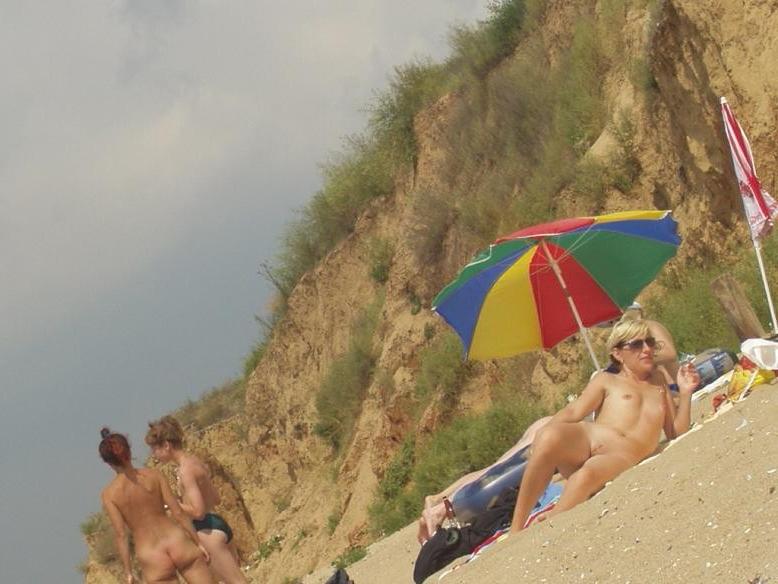 15P Wild redhead teen dances nude at a public beach