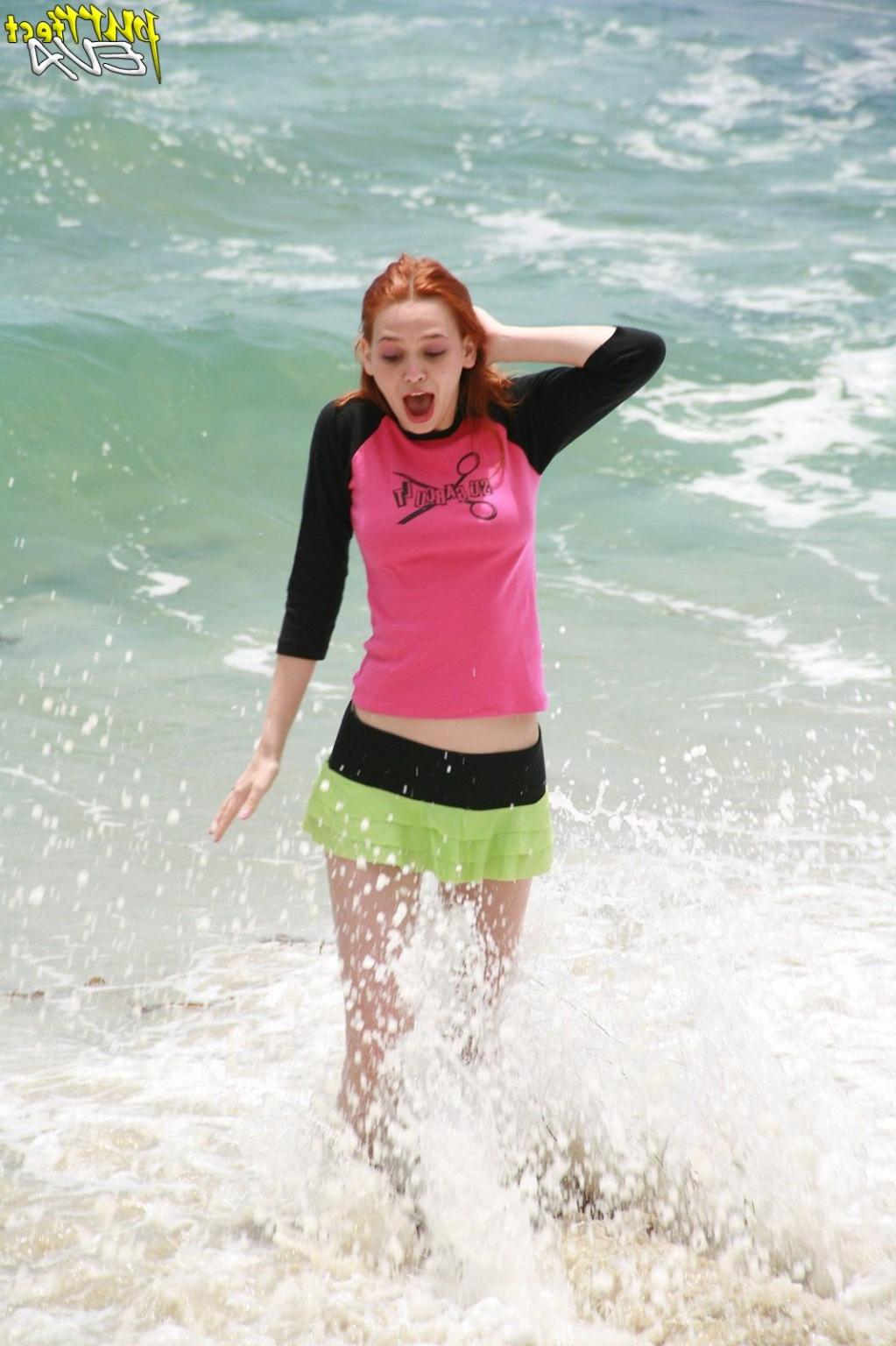 15P Redhead teen playing at the beach