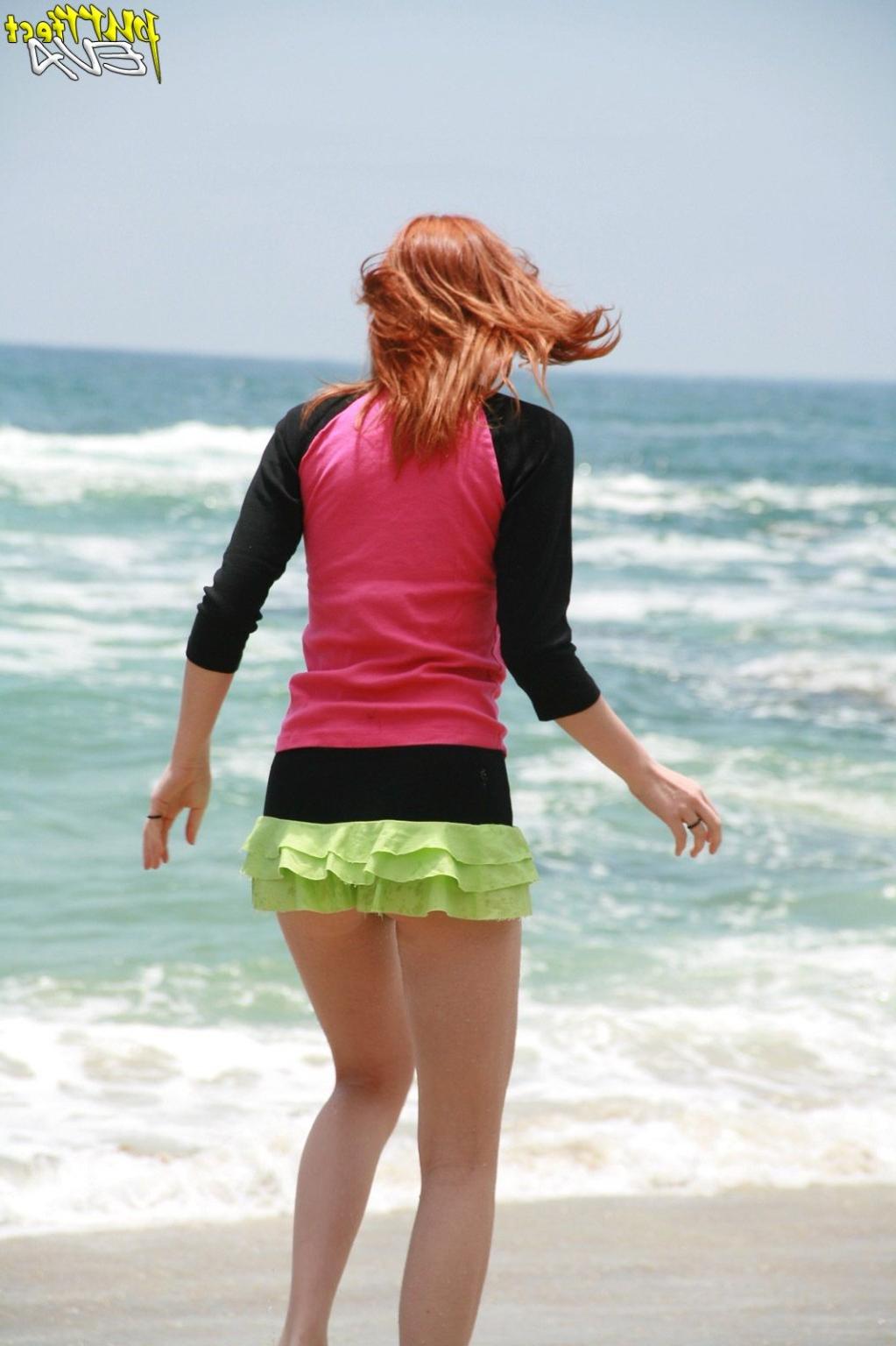 15P Redhead teen playing at the beach