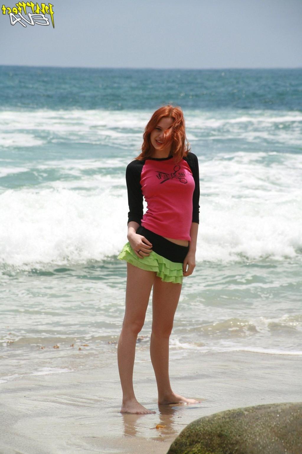 15P Redhead teen playing at the beach