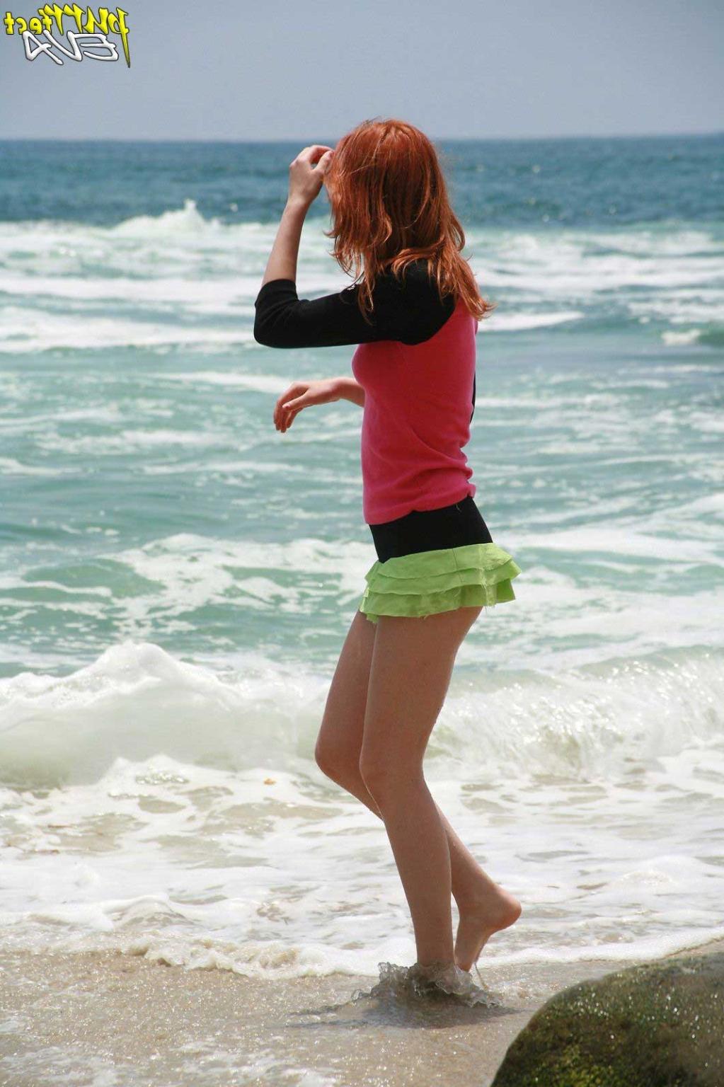 15P Redhead teen playing at the beach