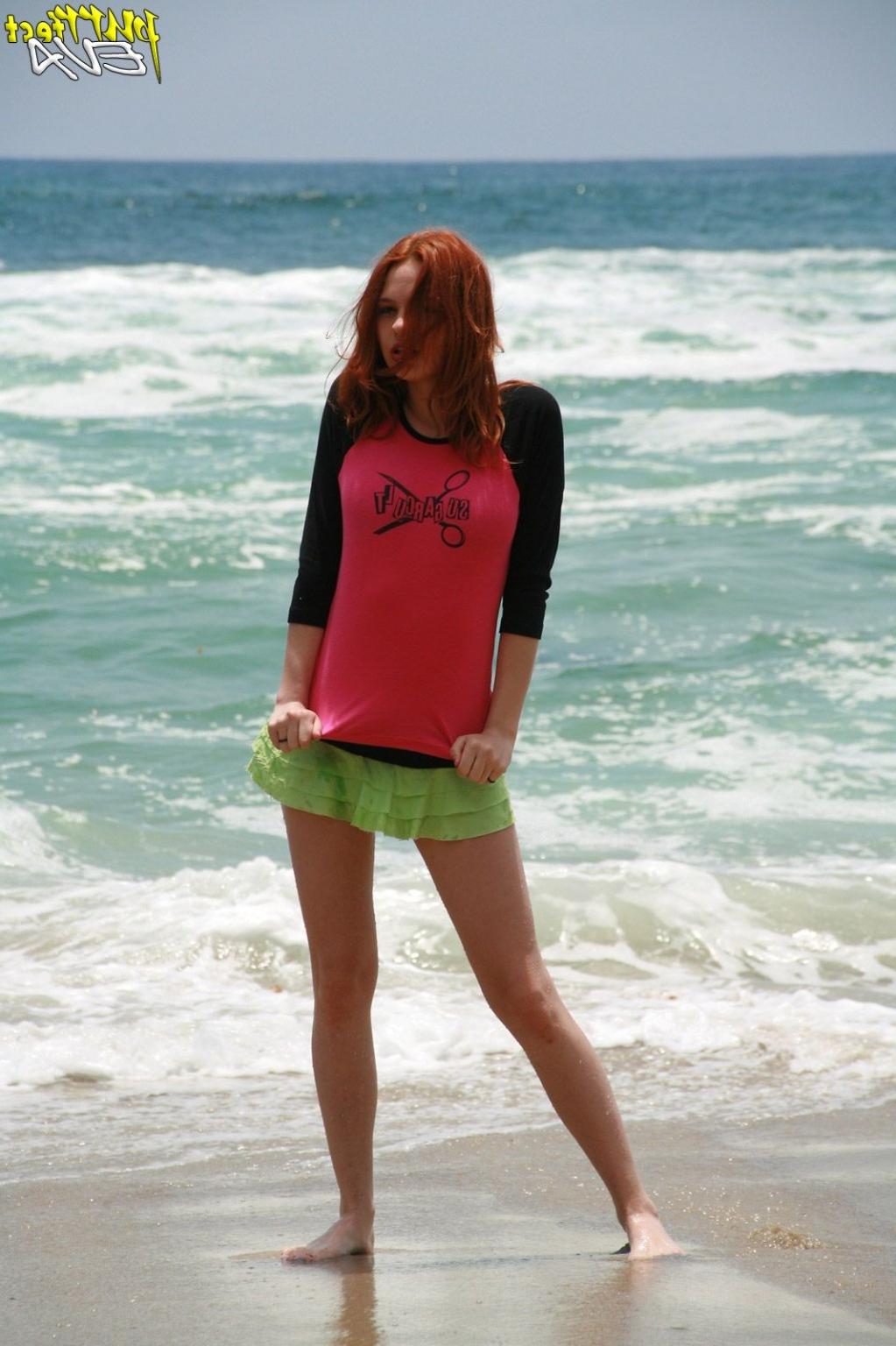 15P Redhead teen playing at the beach