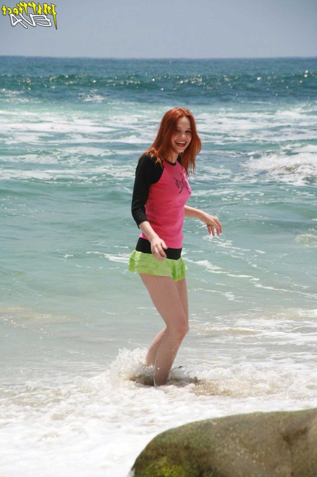 15P Redhead teen playing at the beach