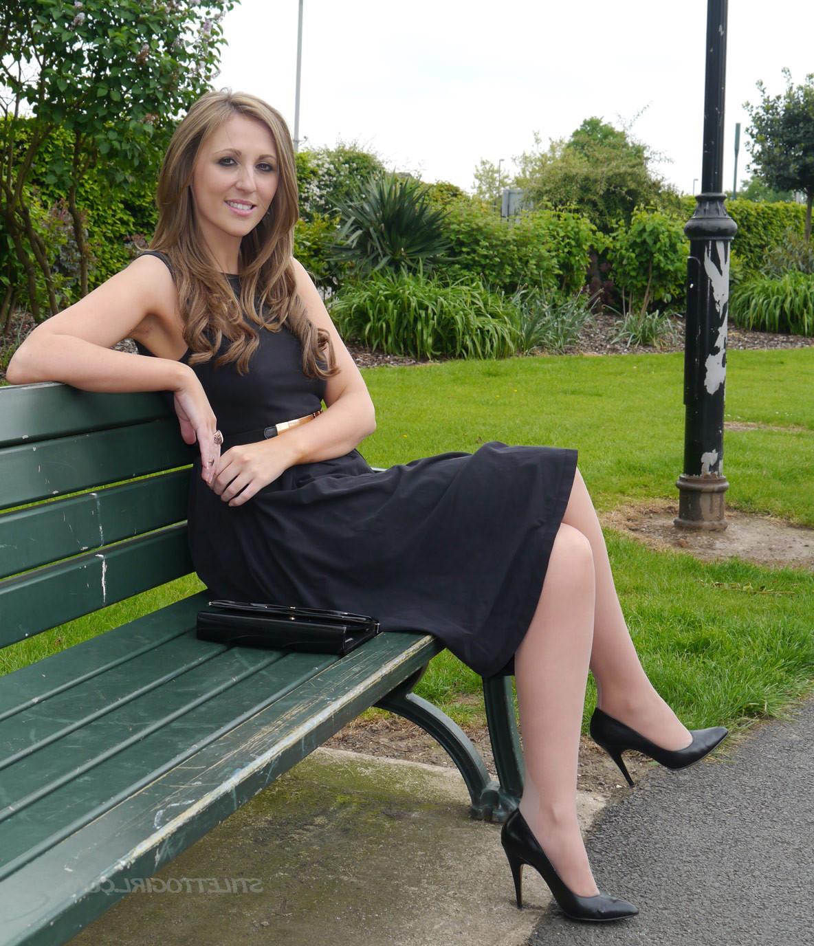 16P Sexy brunette takes a stroll into the park in a pretty dress and