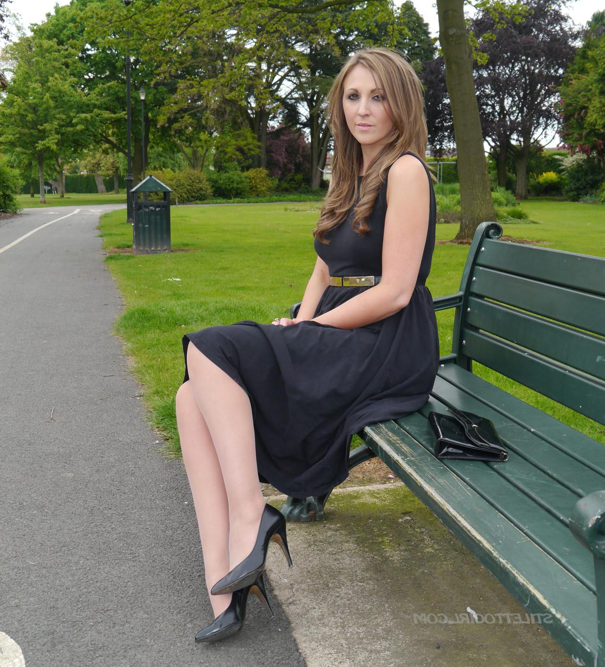 16P Sexy brunette takes a stroll into the park in a pretty dress and