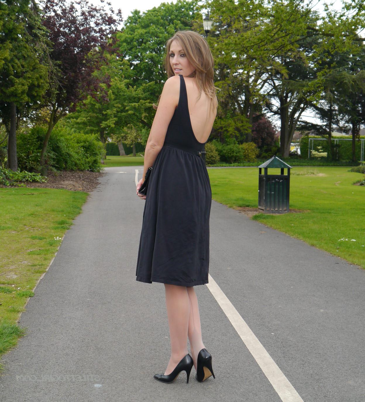 16P Sexy brunette takes a stroll into the park in a pretty dress and
