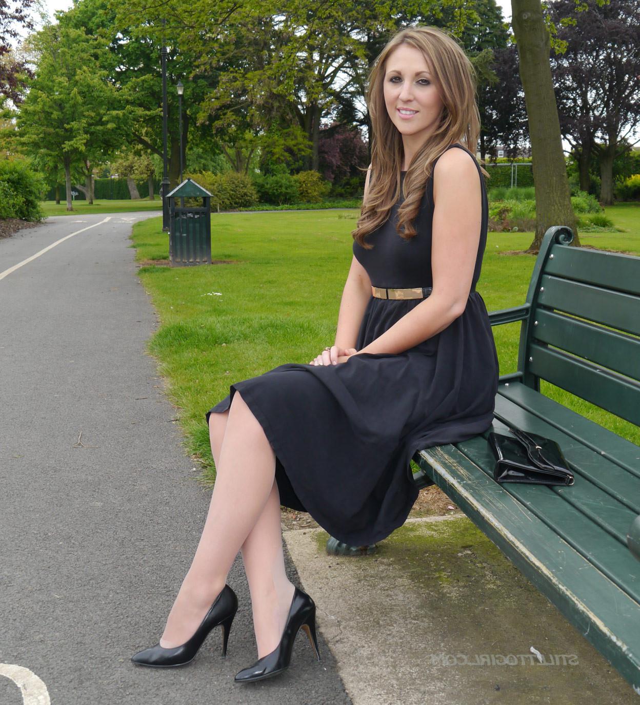 16P Sexy brunette takes a stroll into the park in a pretty dress and