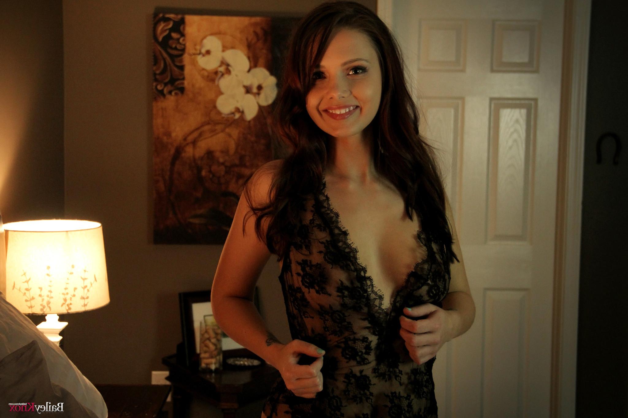 16P Petite brunette beauty on her bed in lace black lingerie