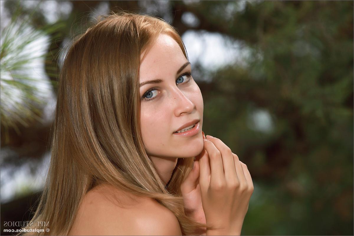 12P Cute teen Izabel enjoys nature totally naked outdoors