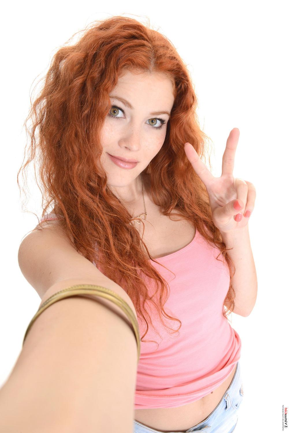 15P Beauty redhead teen stripping and posinbg naked