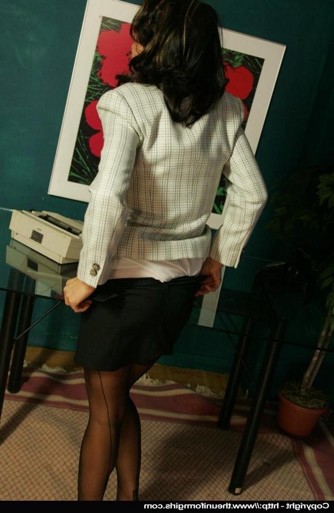 15P Brunette secretary strips down to her black stockings
