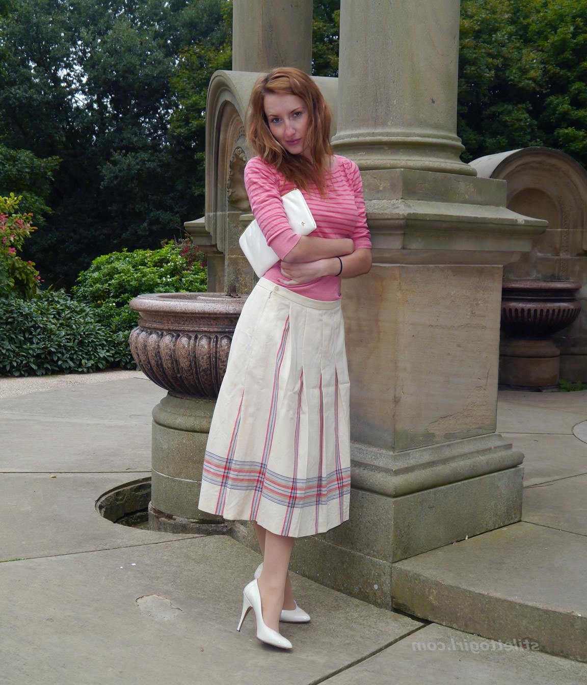 15P Cute redhead babe poses in a pair of lovely white high heeled stilettos for all 