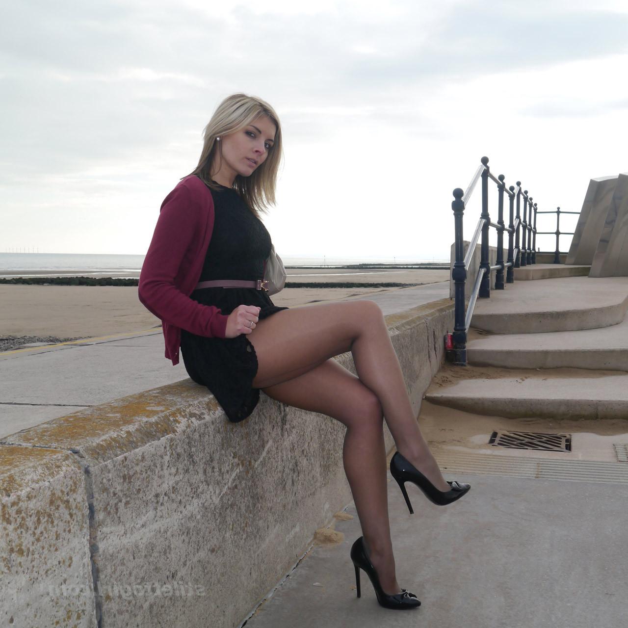 16P Gorgeous leggy blonde Naomi teases outdoors in a cute black summer dress sexy ny