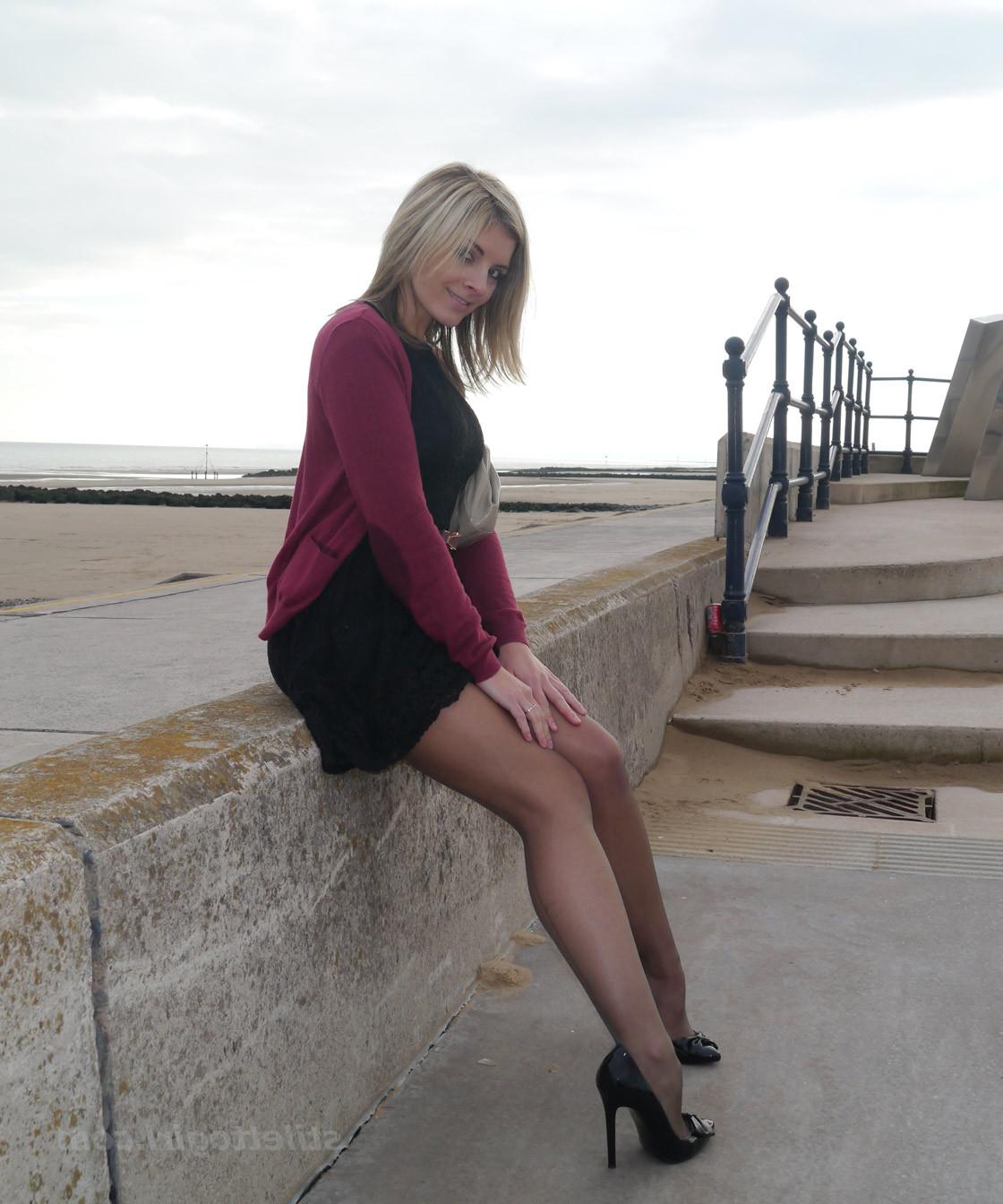 16P Gorgeous leggy blonde Naomi teases outdoors in a cute black summer dress sexy ny