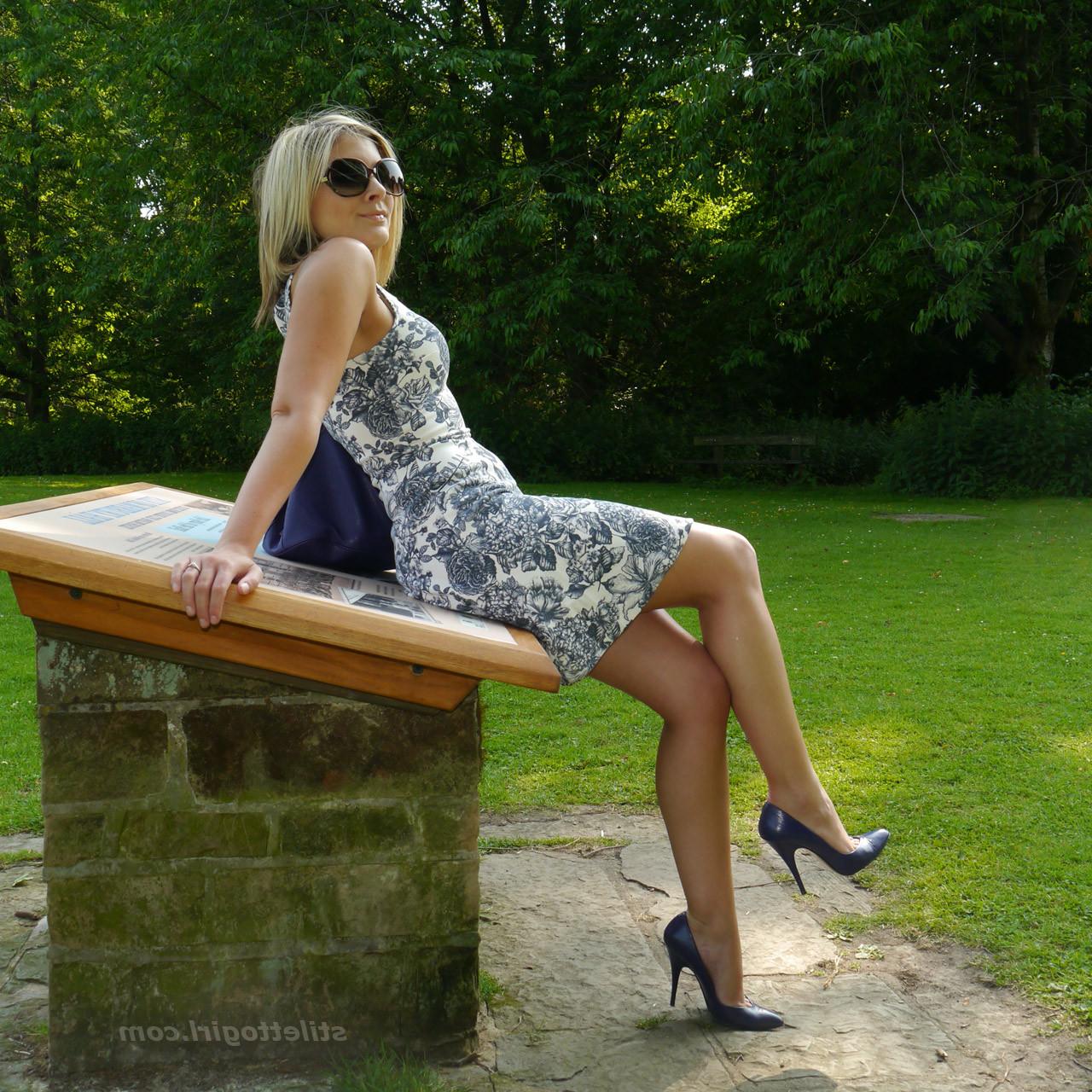 16P Blonde goddess Naomi is flashing her cheeky long legs in shiny nylons and high p