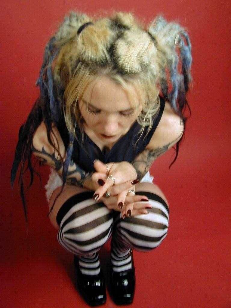 16P Kinky goth girl strips naked and spreads her shaved pussy