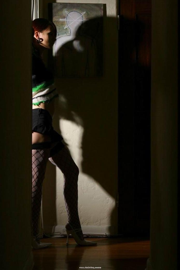 15P Erotic redhead teen hot in her stockings