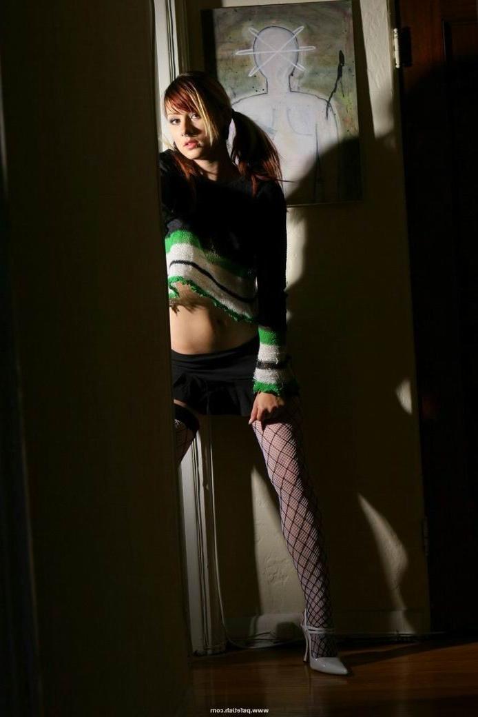 15P Erotic redhead teen hot in her stockings
