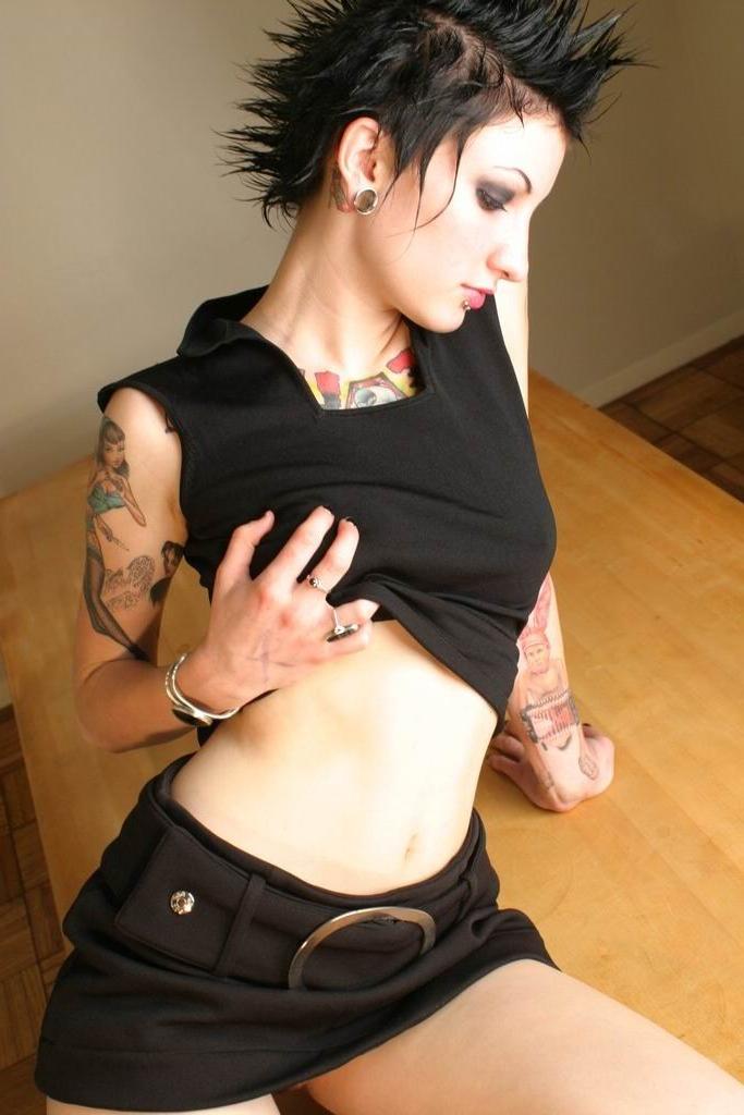 16P Sexy goth babe strips naked to show her piercings and tattoos