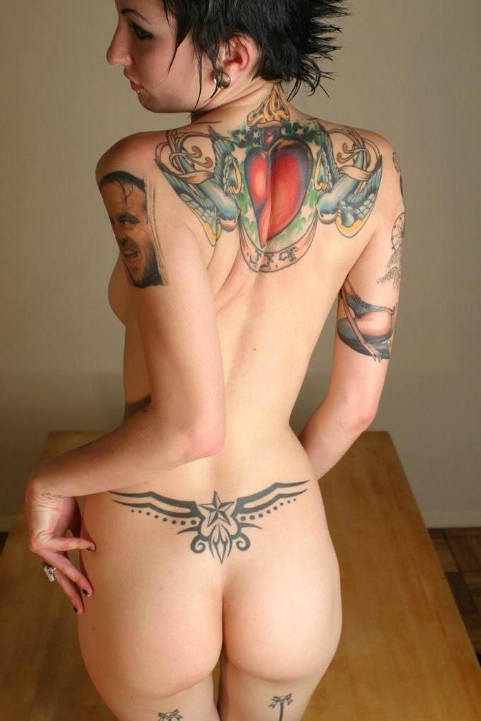 16P Sexy goth babe strips naked to show her piercings and tattoos