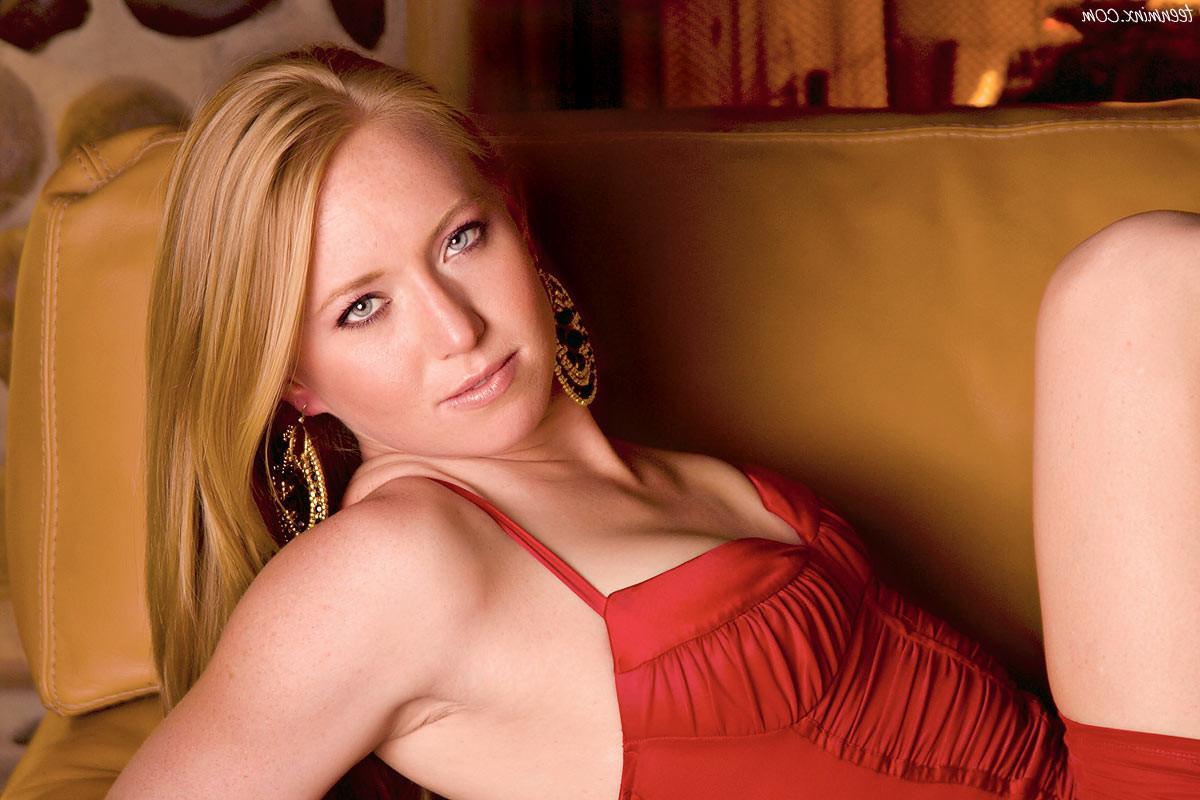 19P Ravishing redhead beauty strips naked in front of a fireplace