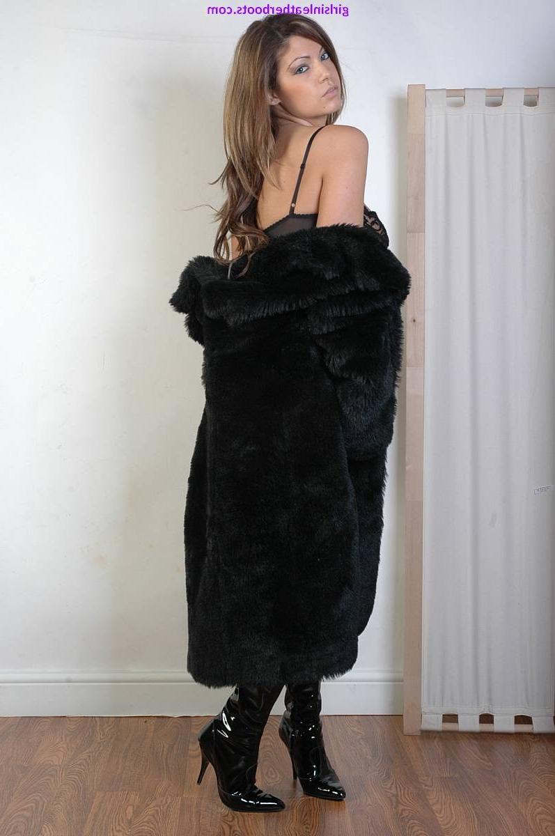 15P Stunning busty brunette looks so sexy in black thigh high leather boots and hot 