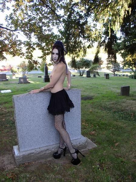 16P Outdoor gothic girl posing with a knife