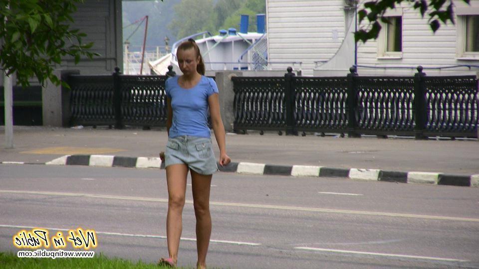 14P Gal with long ponytail spreading and wetting herself on a garden bench