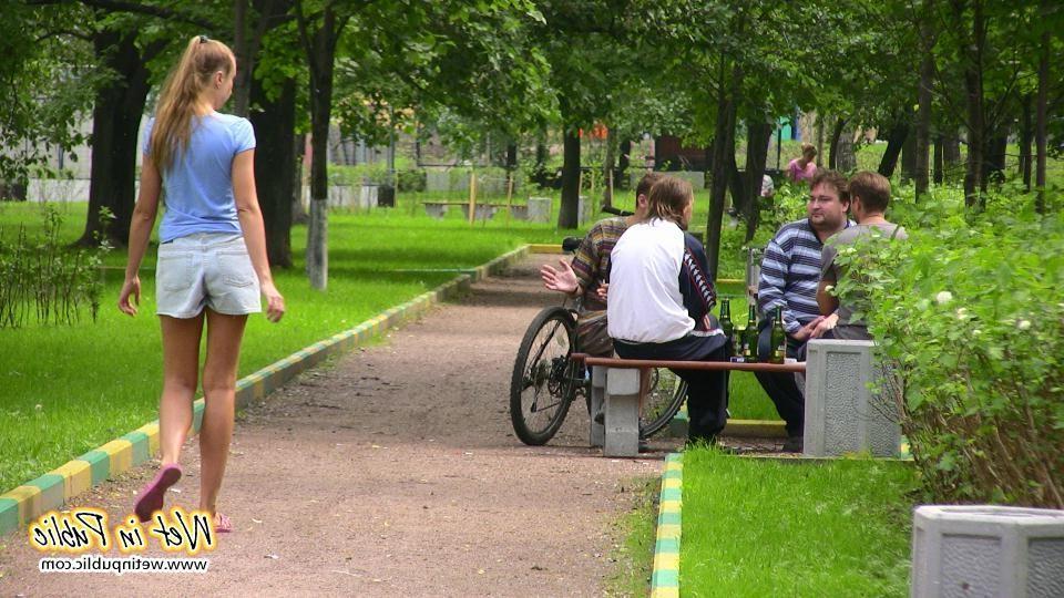 14P Gal with long ponytail spreading and wetting herself on a garden bench