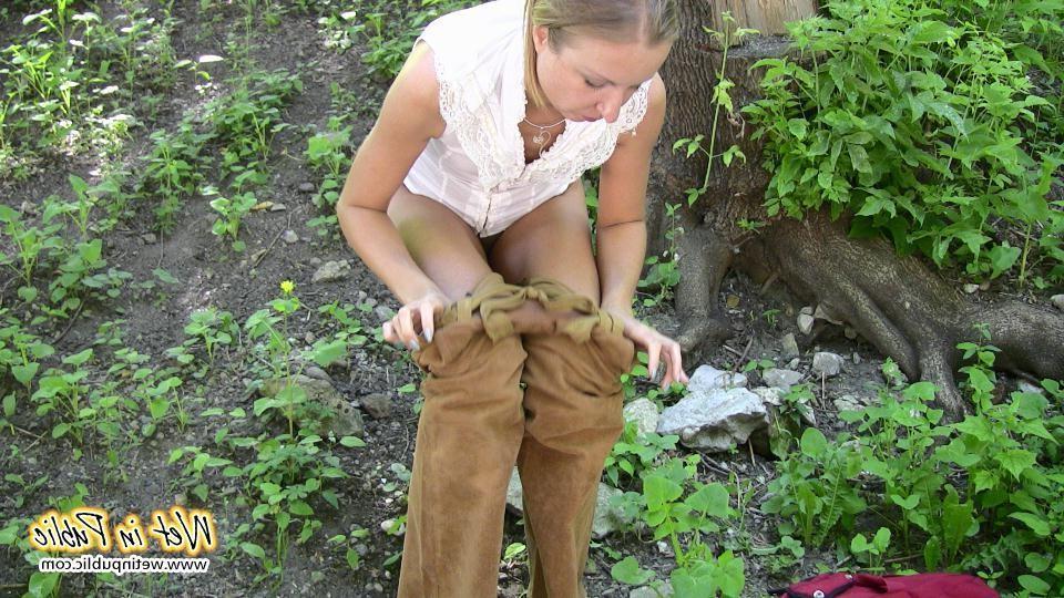14P Desperate gal pees through her velvet pants on a city river embankment