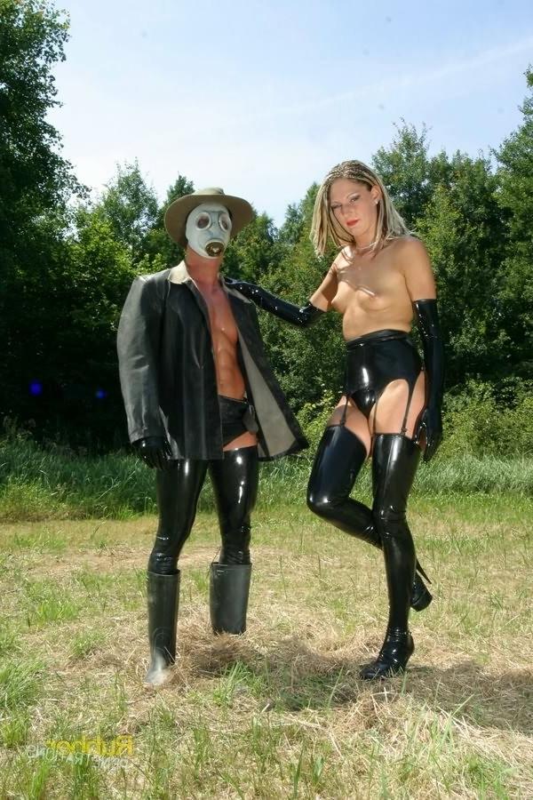 16P Kinky rubber slut getting fucked by a guy in gas mask outdoors