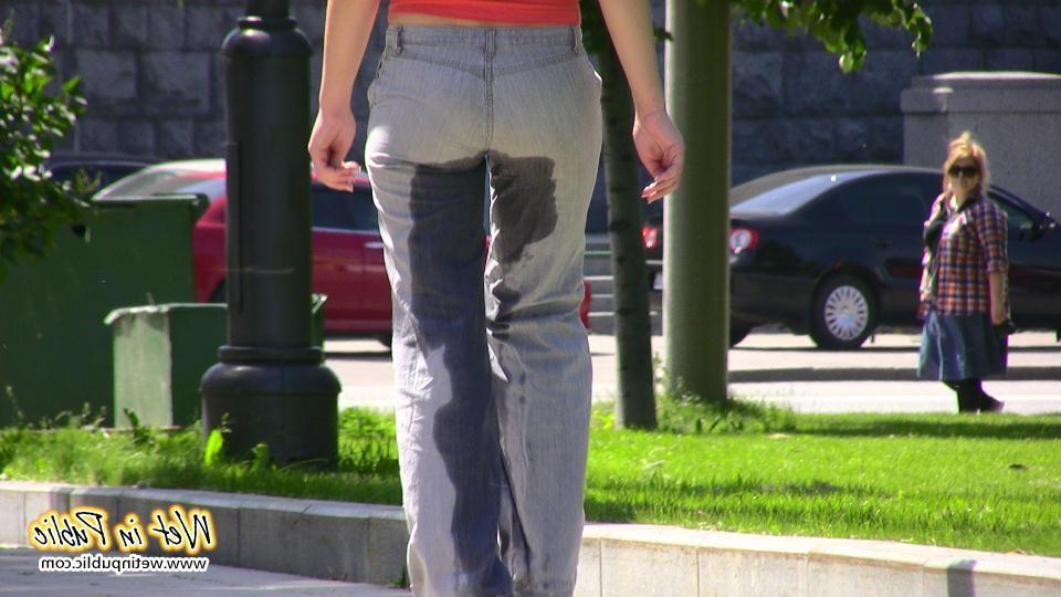 14P Pretty lady pees right through her jeans making them all wet and smelly