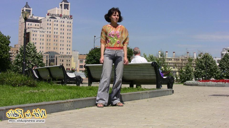 14P Pretty lady pees right through her jeans making them all wet and smelly
