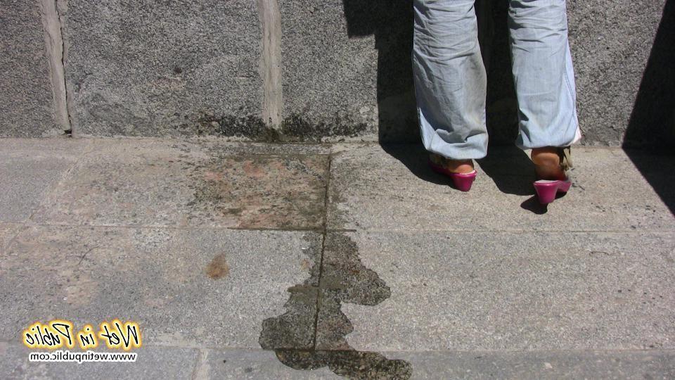 10P Chick squats down and a powerful spurt of pee bursts through her pants