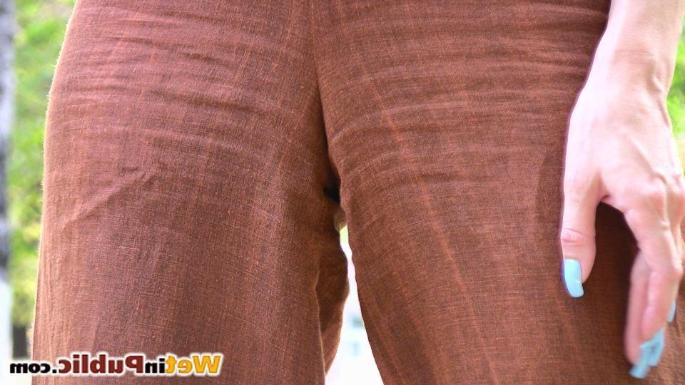14P Blonde chick wets herself and leaves a puddle of piss on a sidewalk