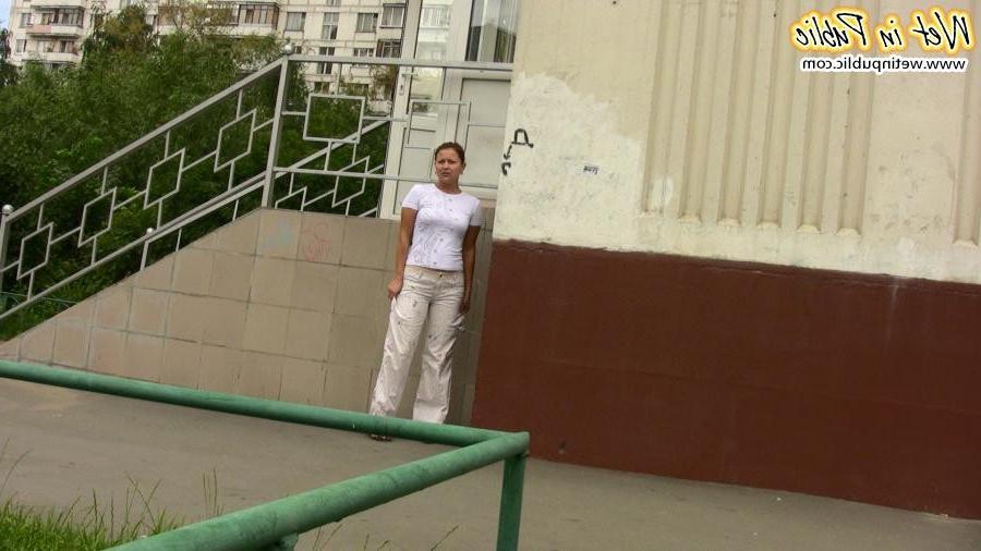 15P Confused babe desperately tries to hide her public pissing disgrace