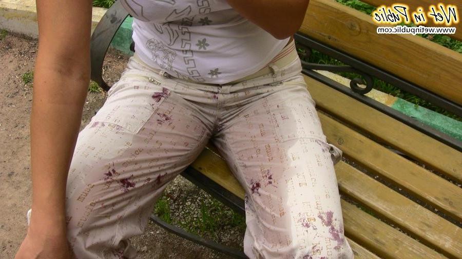 15P Confused babe desperately tries to hide her public pissing disgrace