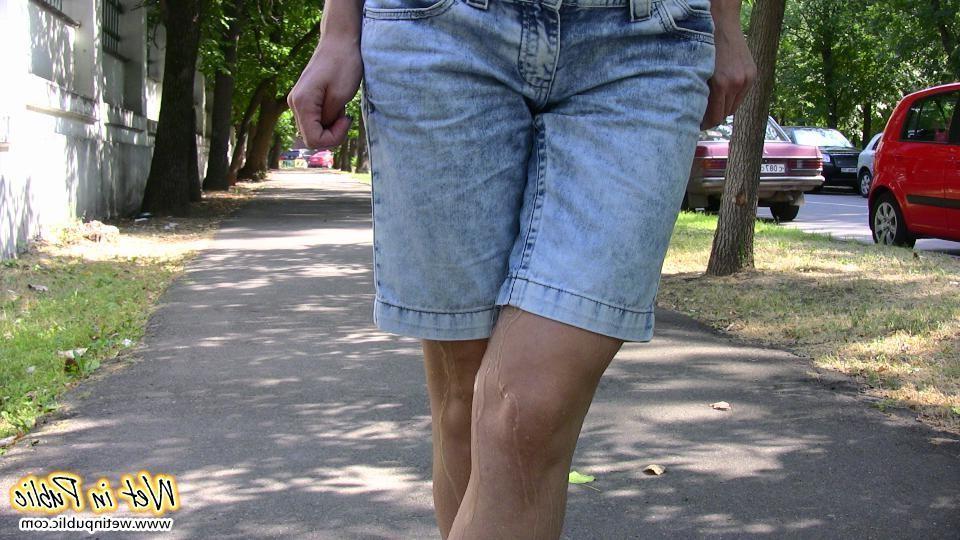 15P Moistened jean shorts and wet sexy legs of a slender unlucky cutey