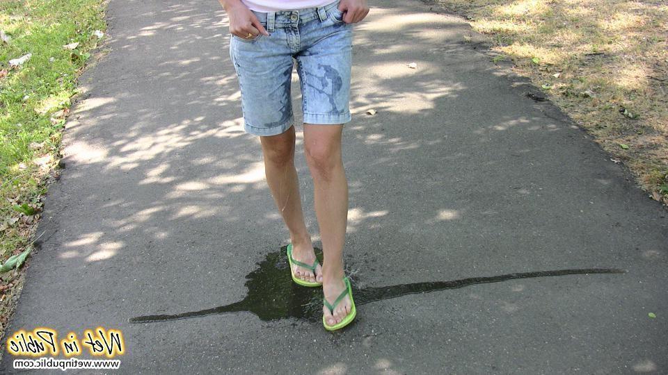 15P Moistened jean shorts and wet sexy legs of a slender unlucky cutey