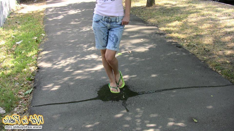 15P Moistened jean shorts and wet sexy legs of a slender unlucky cutey
