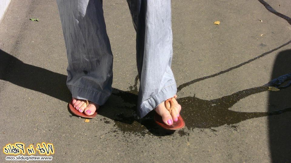 12P Perplexed babe in gray jeans who turned suddenly into a pee-wet slut