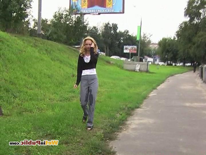 15P Blondie can not hold urine in and pisses in her grey pants in public