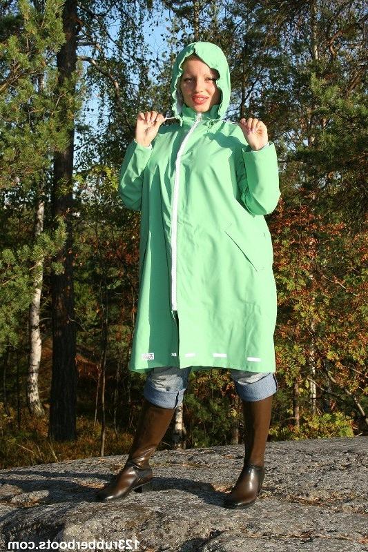 20P Hot girl in tight jeans and rubber rainwear