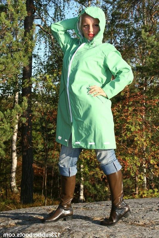 20P Hot girl in tight jeans and rubber rainwear