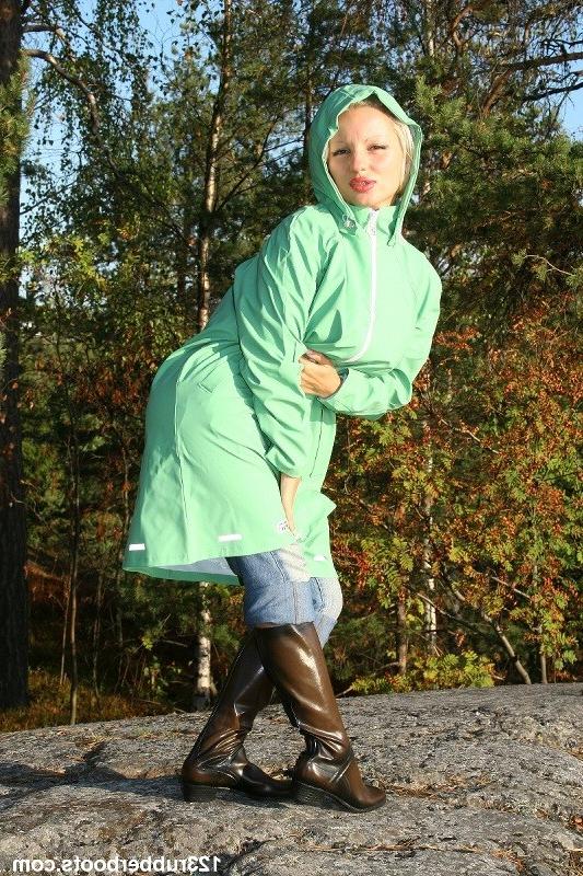 20P Hot girl in tight jeans and rubber rainwear
